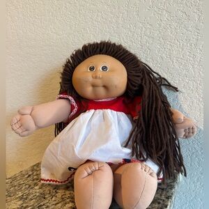Charming Doll with Brown Hair and Red-White Dress